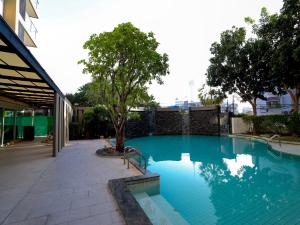 Piscina de la sau aproape de Dwija Hotel & Suite