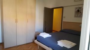 Ein Bett oder Betten in einem Zimmer der Unterkunft Albergo La Caravella