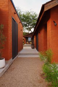 a building with a door on the side of it at Aerys Village in Somone +13 photos