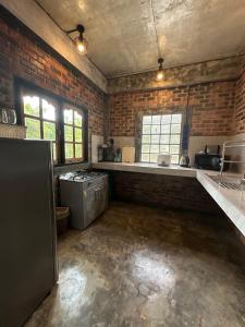 Køkken eller tekøkken på Baan Malee Villa