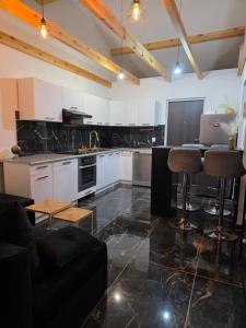 Nhà bếp/bếp nhỏ tại Domek całoroczny Jantar - 2 sypialnie, max 6 osób