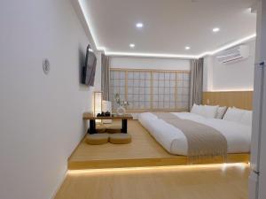 Postel nebo postele na pokoji v ubytování star house akihabara ueno tokyo