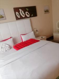 Postel nebo postele na pokoji v ubytování Neo & ruks guest houses Boston Belleville 4 + 7 fotografií