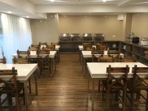 Restaurace v ubytování GreenTree Inn Fuzhou Eastern Capital Express Hotel