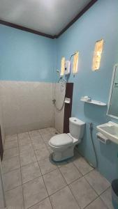 a bathroom with a toilet and a sink at Adam Bungalows in Ao Nang Beach