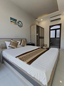 Giường trong phòng chung tại H&Kim Homestay +5 ảnh