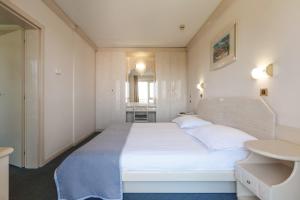 Postel nebo postele na pokoji v ubytování Hotel Gran Vista Plava Laguna