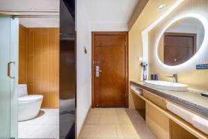 Koupelna v ubytování 上饶鹿华摹尔酒店经济开发区吾悦广场店