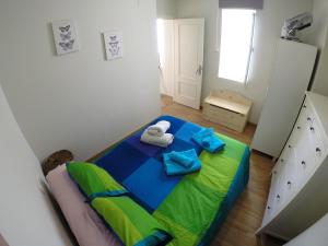 En eller flere senge i et værelse på DescubreHome Sacramento