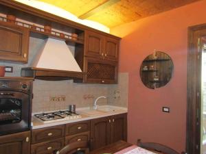 A kitchen or kitchenette at La Casetta