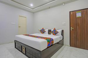 Postel nebo postele na pokoji v ubytování FabHotel Bluemoon Residency + 23 fotografií