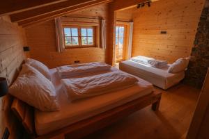 Ένα ή περισσότερα κρεβάτια σε δωμάτιο στο Mountain Lodge Stummerberg