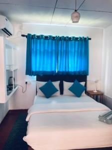 Ένα ή περισσότερα κρεβάτια σε δωμάτιο στο Memo's Inn +38 φωτογραφίες