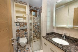 Ένα μπάνιο στο BUTİK 24 SUİTES +16 φωτογραφίες