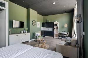 TV a/nebo společenská místnost v ubytování RCN Vakantiepark Toppershoedje