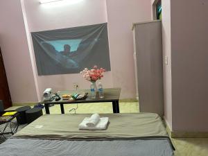 Giường trong phòng chung tại 21 Cinemax - Giang Liễu