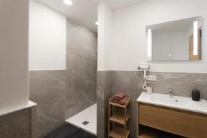 Ванная комната в Appartements Gasthaus Eichholzer +22 фотографии