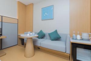 Posezení v ubytování JI Hotel Hangzhou Linping Yintai City + 17 fotografií