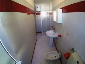 Phòng tắm tại Apartments Beachfront in Rosolina Mare 33984