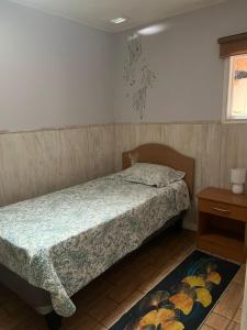 Ένα ή περισσότερα κρεβάτια σε δωμάτιο στο Samka alojamiento