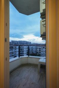 a view from a door of a balcony with a window at Visse Hotel in Mudanya