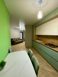 Kuchyň nebo kuchyňský kout v ubytování River view + 2 fotografie