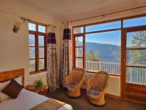 Γενική θέα στο βουνό ή θέα στο βουνό από  αυτό το δωμάτιο σε οικογενειακή κατοικία