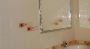 a white bathroom with a sink and a mirror at Seaza Hotel in Ban Khu Khut (1) +32 photos