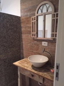 Um banheiro em Casatua Pousada