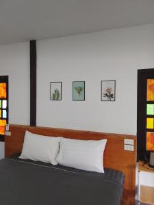 Кровать или кровати в номере DD Beach Houses