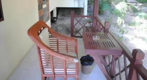 two chairs and a table on a balcony at Baan Suan Sook Resort in Chaweng