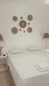 Кровать или кровати в номере Elegant Mykonos 3 Bd Villa w Private Swimming Pool