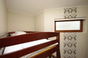 Posteľ alebo postele v izbe v ubytovaní Mosoly Deluxe Apartman