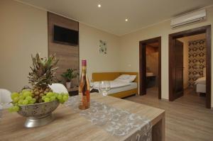 Posteľ alebo postele v izbe v ubytovaní Mosoly Deluxe Apartman