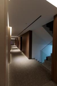 a hallway of a building with a glass floor at Velura Hotel in Ferizaj