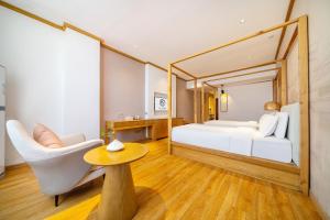 Postel nebo postele na pokoji v ubytování Wuyue Store 2