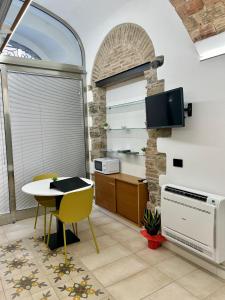 Η κουζίνα ή μικρή κουζίνα στο THE PALACE B&B and Apartments