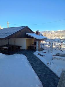 Galeriebild der Unterkunft Pensiunea Maria-Mihaela in Bumbesti Pitic