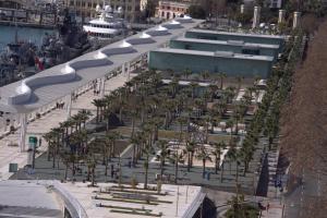 an aerial view of a building with palm trees at Hotel MS Maestranza Málaga in Málaga