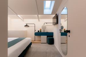 Postel nebo postele na pokoji v ubytování CA' DO' Guest House