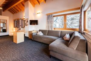 TV a/nebo společenská místnost v ubytování Hotel Garni Försterheim