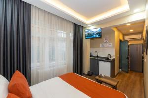 TV/trung tâm giải trí tại hotel La Vitrine