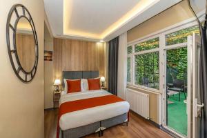 Giường trong phòng chung tại hotel La Vitrine