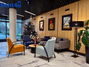 Posezení v ubytování Nad Zatoką Aparthotel Deluxe by Rent4You