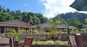 Un jardín fuera de Le Manumea Hotel