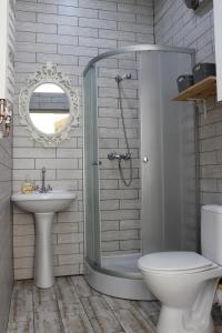 Kúpeľňa v ubytovaní Apartamencik Królewiecka + 6 fotografií