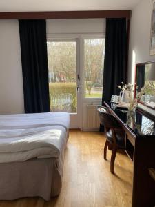 Postel nebo postele na pokoji v ubytování Place Lund