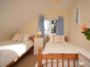 En eller flere senge i et værelse på 6 Bed in Sheldon 41043