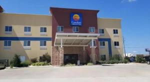 a hotel with a sign on the front of it at Comfort Inn & Suites Tulsa I-44 West - Rt 66 in Sand Springs