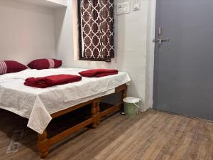 Giường trong phòng chung tại MR Lodge